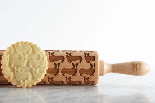 engraved wooden rolling pin welsh corgi pattern on dough