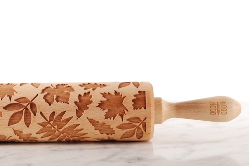 engraved wooden rolling pin leaves