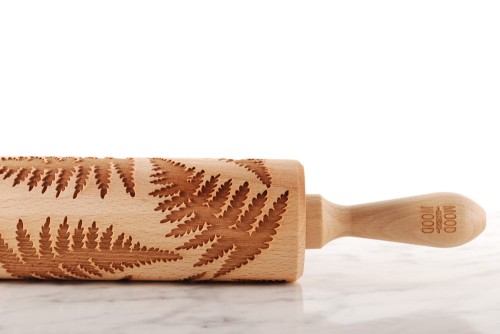 engraved wooden rolling pin Fern on kitchen counter