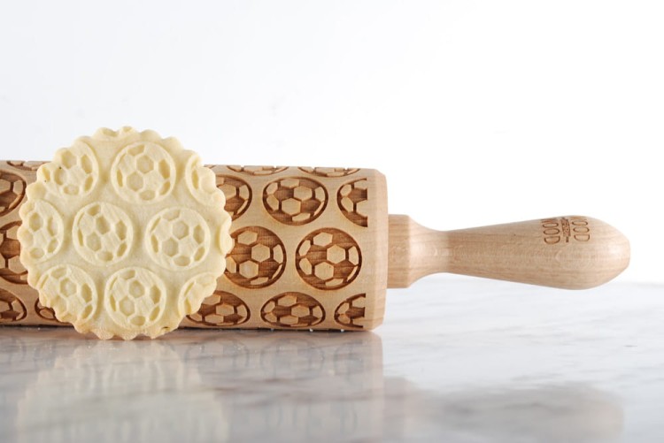 engraved wooden rolling pin with football motif