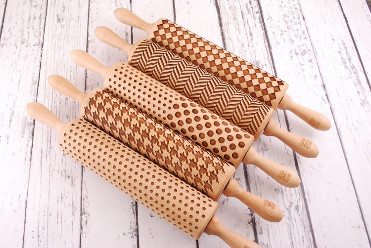 set of five regular size rolling pins  with geometric patterns