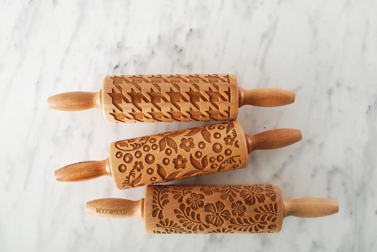 Set of three mini rolling pins for cookies with different designs