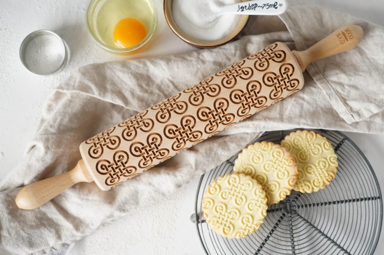 wooden rolling pin with Celtic braid