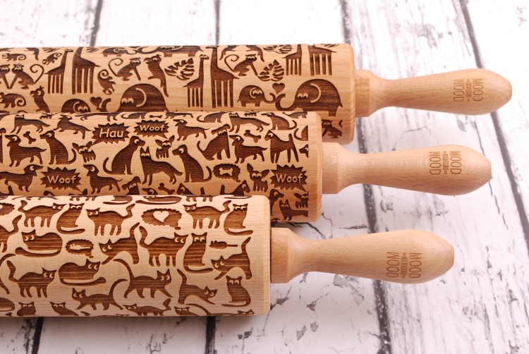 set of wooden rolling pins with lasere negraved animal designs