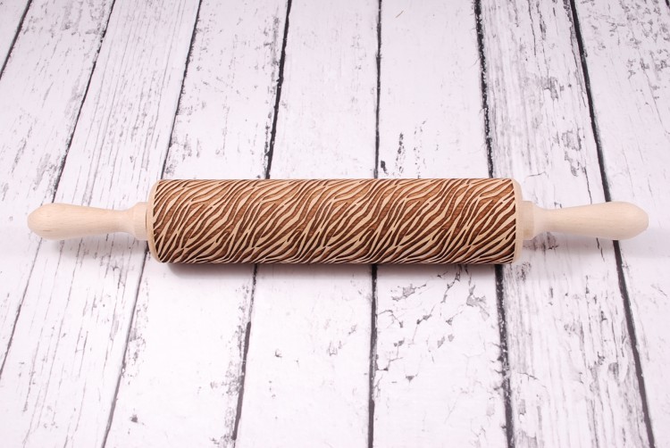 animal pattern rolling pin christmas cookies