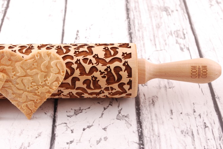 engraved wooden rolling pin squirrels motif on shortbread  Mood for Wood