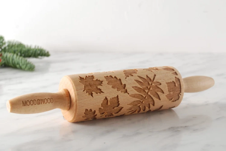 Mini wooden rolling pin with autumn leaves