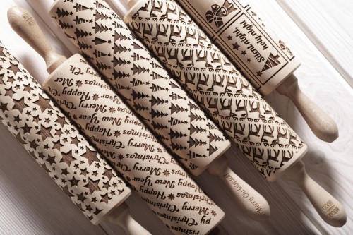 Set of five rolling pins for Christmas baking