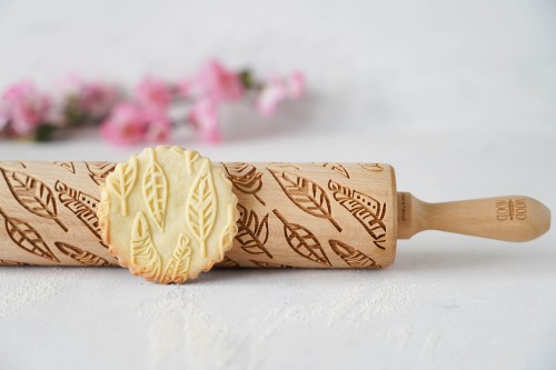 engraved rolling pin feathers boho
