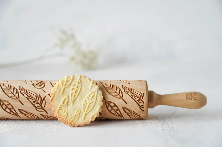 eco friendly beech rolling pin feathers