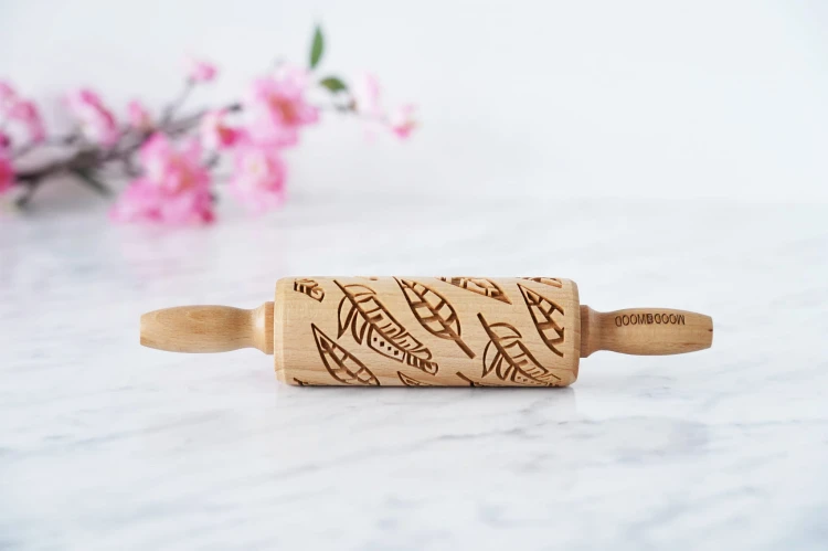 Mini wooden rolling pin for embossing on pastries