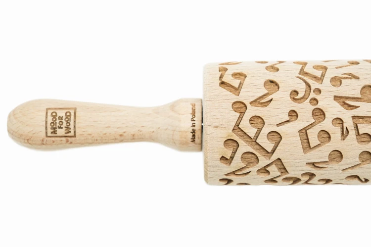 engraved wooden rolling pin music notes