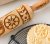 MoodForWood embossed wooden rolling pin with beautifully patterned shortbread cookies. Create stunning homemade baked treats with a decorative rolling pin and impress with every detail.