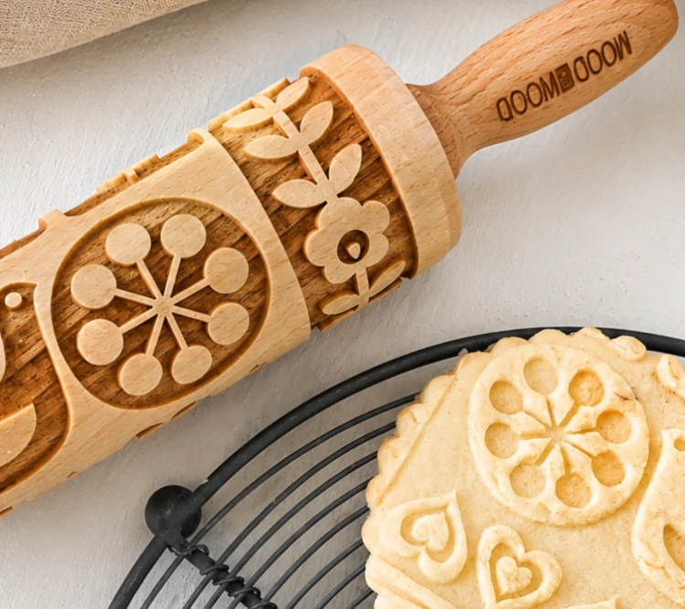 MoodForWood embossed wooden rolling pin with beautifully patterned shortbread cookies. Create stunning homemade baked treats with a decorative rolling pin and impress with every detail.
