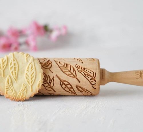 engraved rolling pin feathers boho