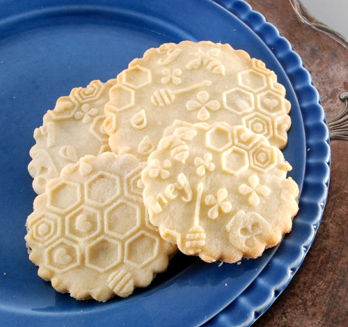 Honey cookies embossed with bees and honeycomb