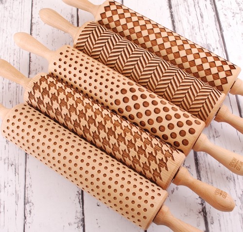 set of five regular size rolling pins  with geometric patterns