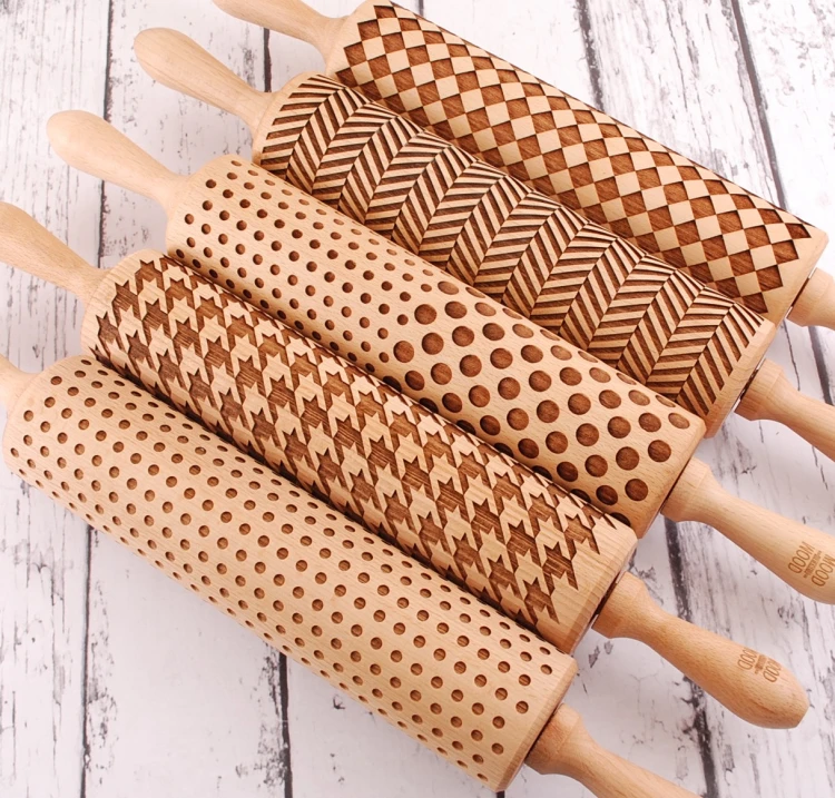 set of five regular size rolling pins  with geometric patterns