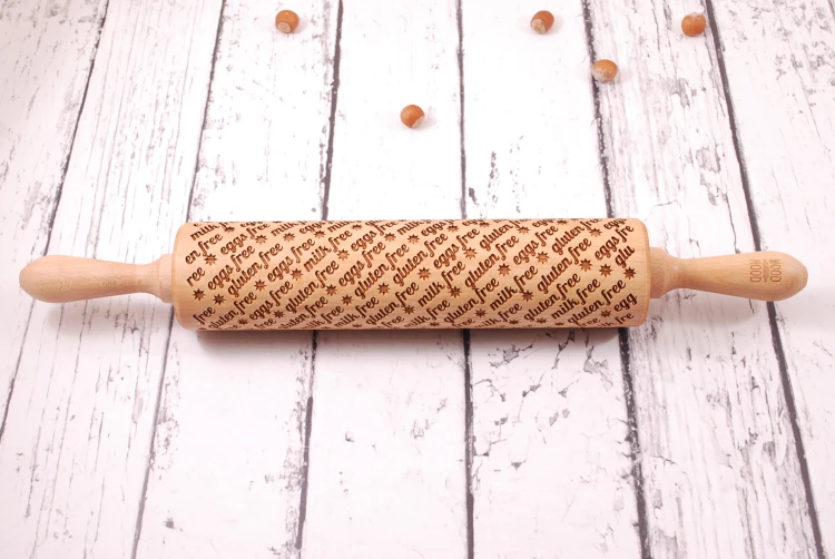Wooden embossed rolling pin for diet cookies